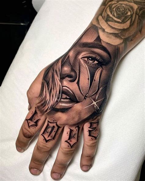 chicano hand tattoo|chicano traditional tattoo.